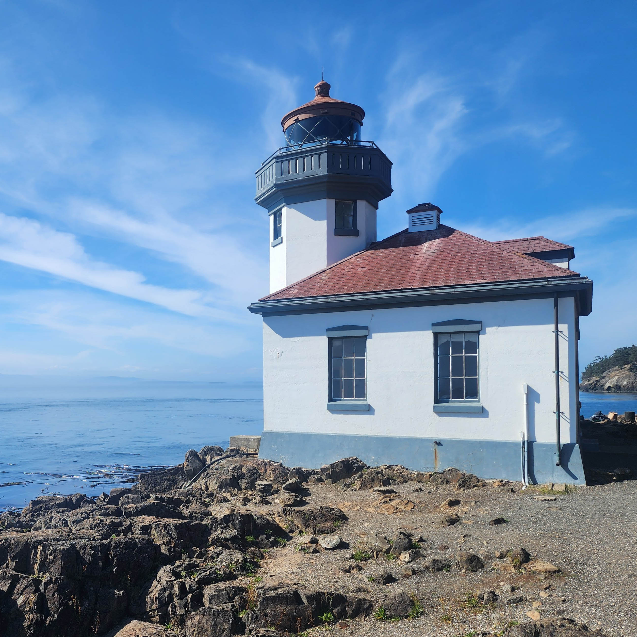 Lighthouse Peering Above the Rocks | Photographed on Samsung Galaxy S22 Ultra